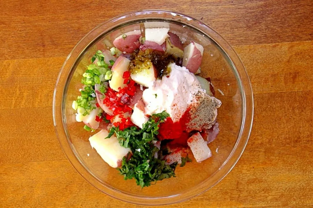 Potato salad ingredients in bowl
