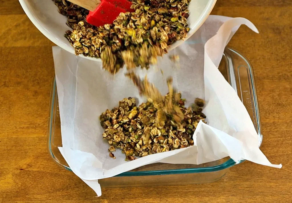 Healthy granola bars mixture in baking dish